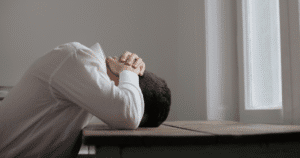 person feeling financial stress despite high income